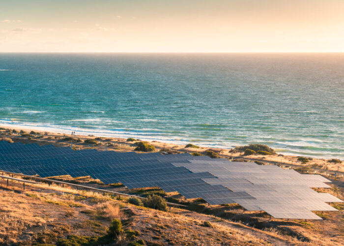 Solar panels installed along the coastline at sunset in South Australia